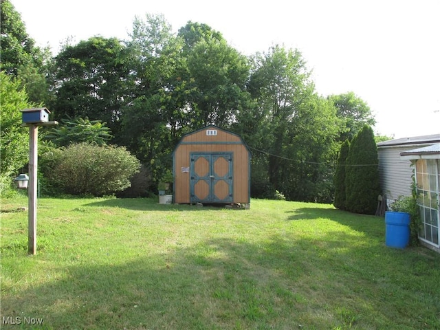 114 Quail Ln, Saint Marys, WV 26170 - view of grassy yard with a shed