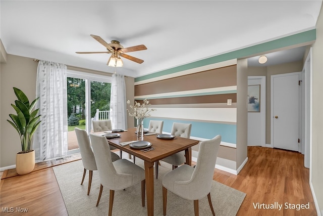 484 E 319th St, Willowick, OH 44095 - dining area featuring a ceiling fan and light wood-style floors