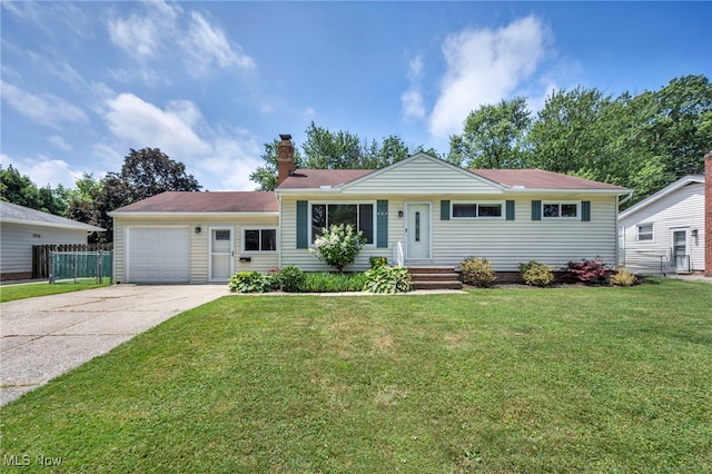 484 E 319th St, Willowick, OH 44095 - ranch-style home with a chimney, a garage, concrete driveway, and a front lawn