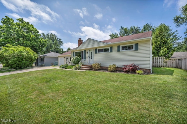 484 E 319th St, Willowick, OH 44095 - ranch-style home featuring a garage, concrete driveway, and a chimney