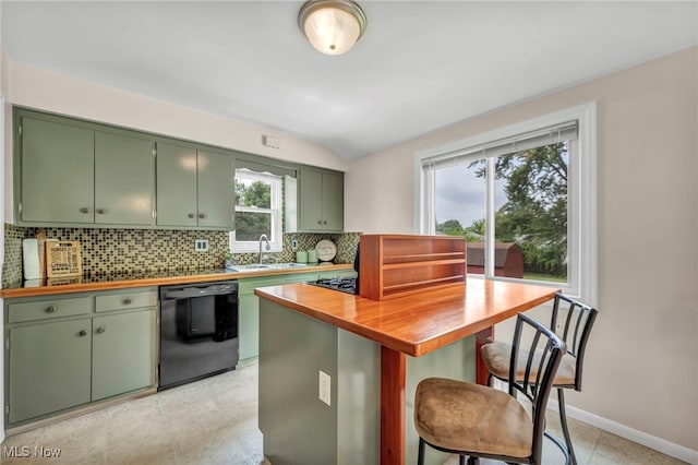 484 E 319th St, Willowick, OH 44095 - kitchen with black dishwasher, green cabinetry, decorative backsplash, lofted ceiling, and wood counters