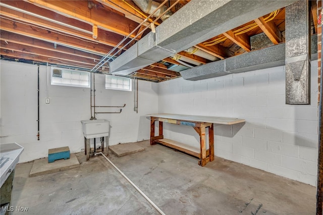 484 E 319th St, Willowick, OH 44095 - below grade area featuring a workshop area and concrete block wall