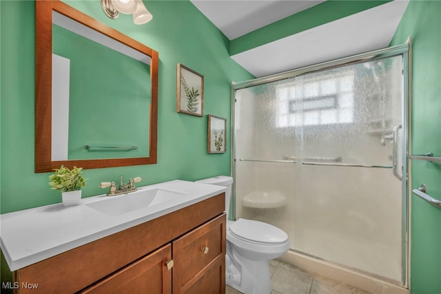 484 E 319th St, Willowick, OH 44095 - full bath with vanity, a stall shower, and tile patterned floors