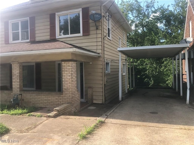 204 Beech Rd, Weirton, WV 26062 - view of front of house with driveway and brick siding