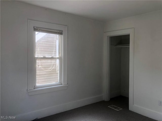 204 Beech Rd, Weirton, WV 26062 - unfurnished bedroom featuring dark colored carpet and baseboards