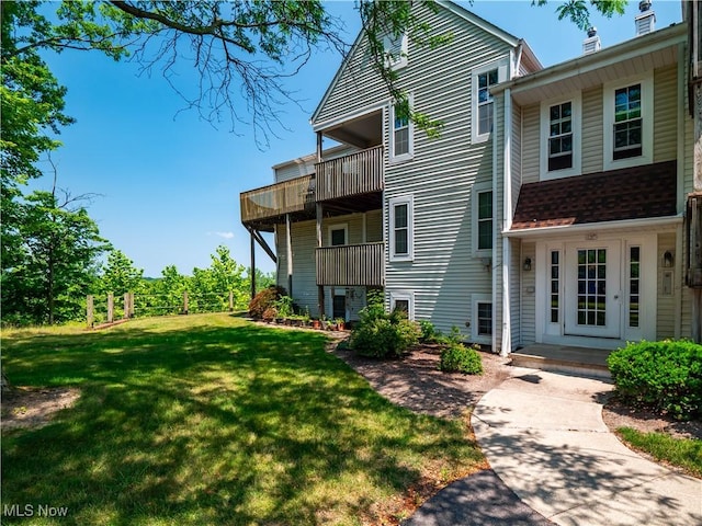 1217 W River Rd N Unit A3, Elyria, OH 44035 - back of property featuring a yard