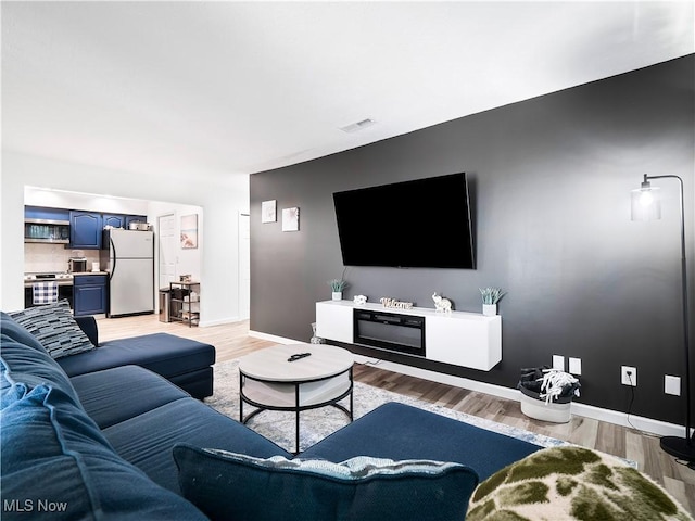 1217 W River Rd N Unit A3, Elyria, OH 44035 - living area featuring light wood-style flooring
