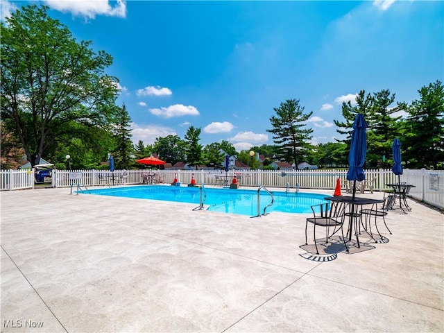 1217 W River Rd N Unit A3, Elyria, OH 44035 - community pool featuring a patio area
