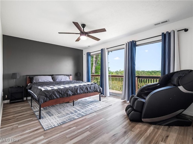 1217 W River Rd N Unit A3, Elyria, OH 44035 - bedroom featuring access to outside, wood finished floors, and ceiling fan