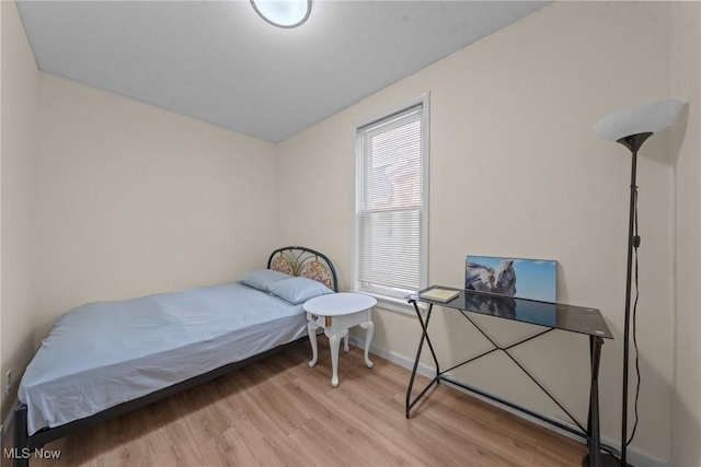 1411 E 47th St, Cleveland, OH 44103 - bedroom featuring wood finished floors and baseboards