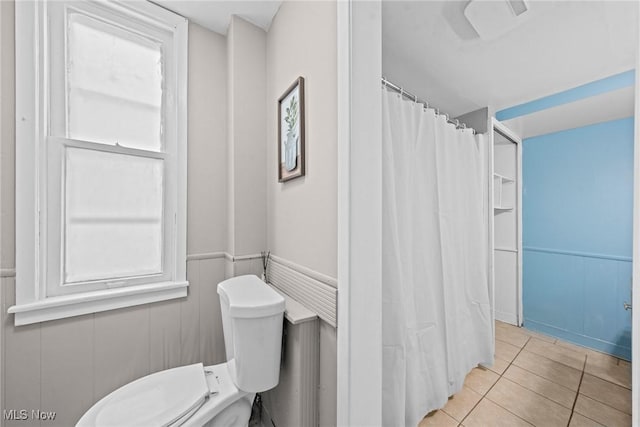 1411 E 47th St, Cleveland, OH 44103 - full bath with tile patterned floors and a shower with curtain