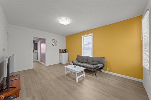 1411 E 47th St, Cleveland, OH 44103 - sitting room with wood finished floors and baseboards