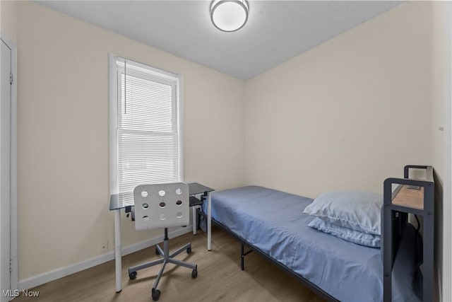 1411 E 47th St, Cleveland, OH 44103 - bedroom featuring wood finished floors and baseboards