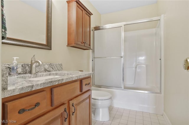 8883 Michaels Ln, Broadview Heights, OH 44147 - full bath featuring vanity, tile patterned flooring, and shower / bath combination with glass door