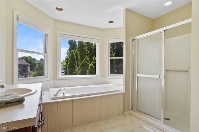 8883 Michaels Ln, Broadview Heights, OH 44147 - full bathroom with a shower stall, a garden tub, and vanity