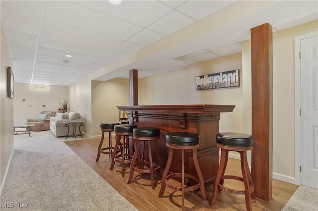 8883 Michaels Ln, Broadview Heights, OH 44147 - indoor dry bar featuring a paneled ceiling and wood finished floors