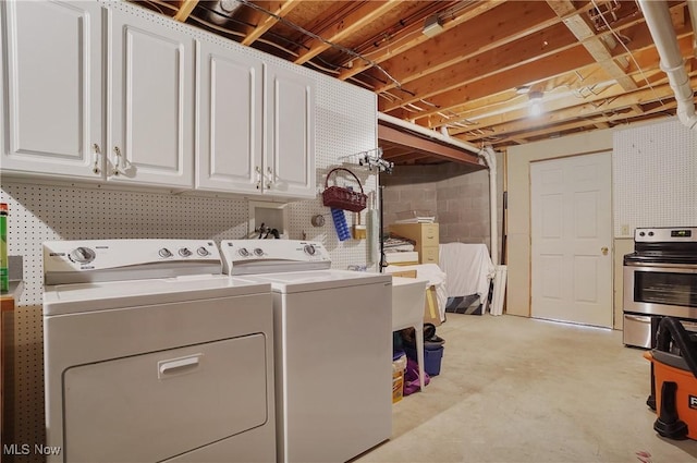 8883 Michaels Ln, Broadview Heights, OH 44147 - washroom featuring washing machine and dryer and cabinet space