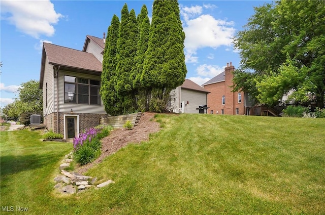 8883 Michaels Ln, Broadview Heights, OH 44147 - rear view of house with a yard and brick siding