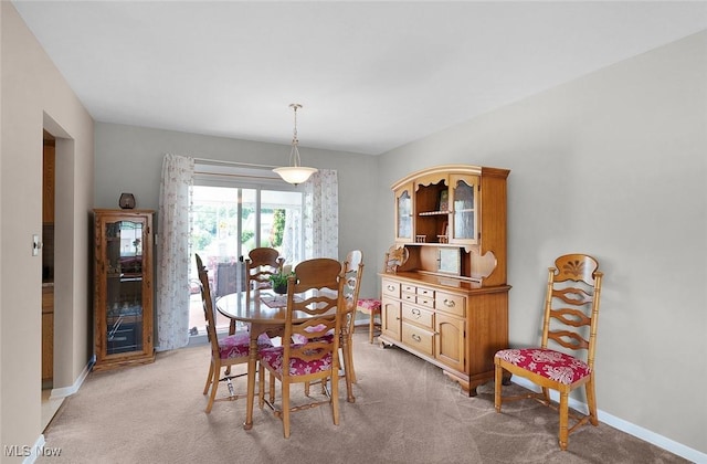6122 Forest Ridge Dr, North Olmsted, OH 44070 - dining room with light carpet and baseboards