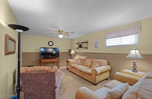6122 Forest Ridge Dr, North Olmsted, OH 44070 - living room featuring carpet flooring, ceiling fan, and wainscoting