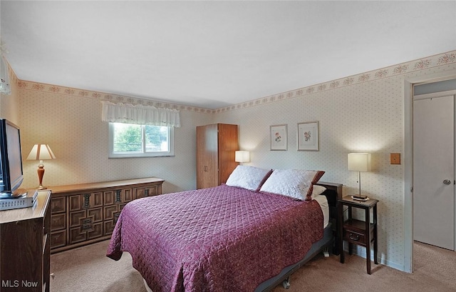 6122 Forest Ridge Dr, North Olmsted, OH 44070 - bedroom with carpet floors and wallpapered walls