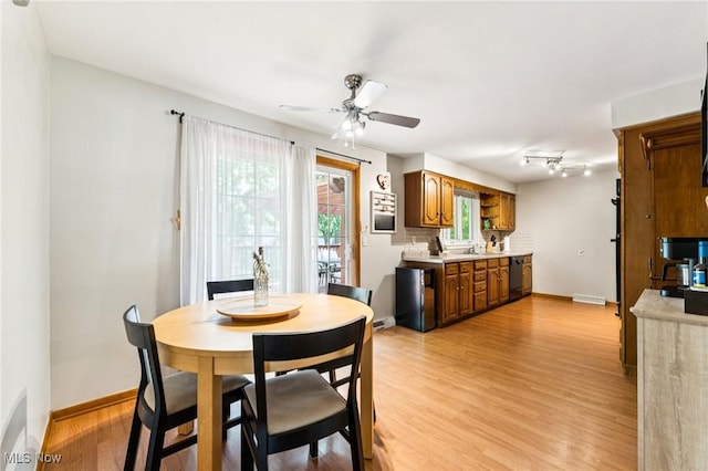 129 Whitman Blvd, Elyria, OH 44035 - dining area with a ceiling fan and light wood finished floors