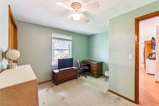 129 Whitman Blvd, Elyria, OH 44035 - home office with ceiling fan and carpet flooring