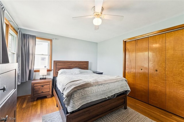 129 Whitman Blvd, Elyria, OH 44035 - bedroom with wood finished floors, a closet, and ceiling fan