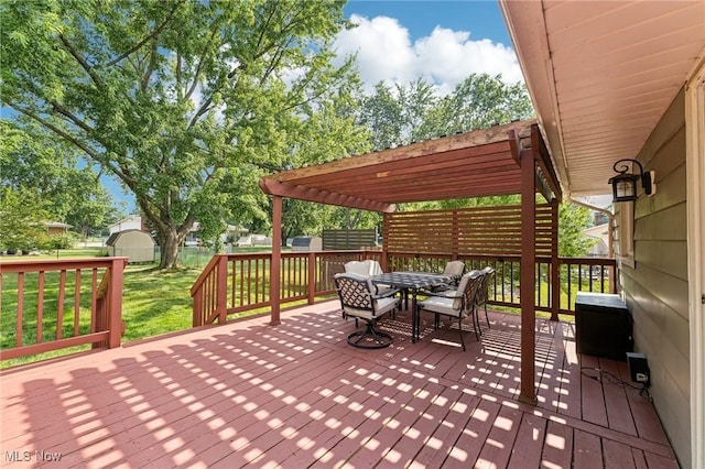 129 Whitman Blvd, Elyria, OH 44035 - wooden deck featuring outdoor dining area and a pergola