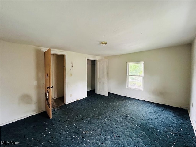518 Jefferson Ave, Cambridge, OH 43725 - unfurnished bedroom featuring carpet flooring
