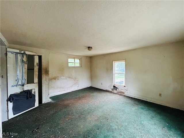 518 Jefferson Ave, Cambridge, OH 43725 - unfurnished room featuring a textured ceiling