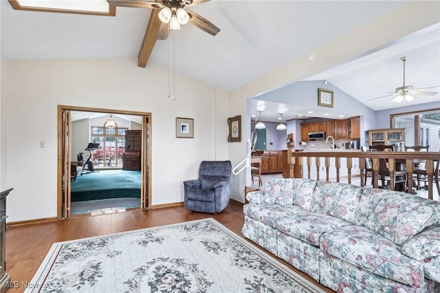 1318 Mirheath Dr, Huron, OH 44839 - living room featuring a ceiling fan and wood finished floors