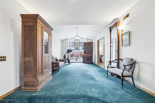 1318 Mirheath Dr, Huron, OH 44839 - sitting room with carpet flooring, lofted ceiling, and a textured ceiling