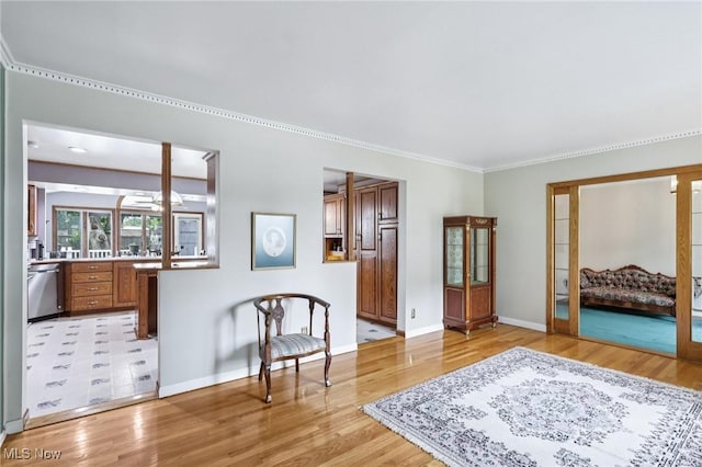 1318 Mirheath Dr, Huron, OH 44839 - entrance foyer featuring light wood-style flooring and crown molding