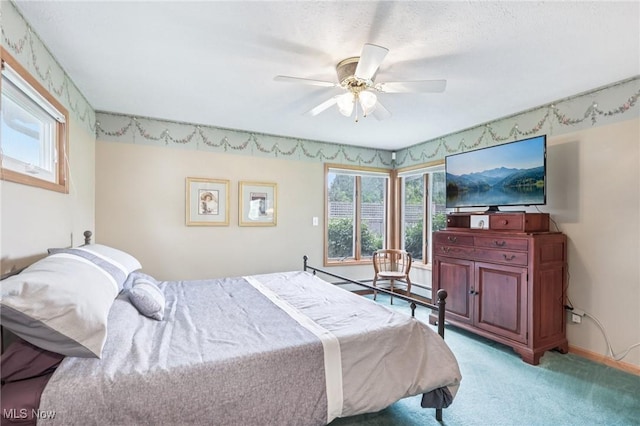 1318 Mirheath Dr, Huron, OH 44839 - bedroom featuring light colored carpet, ceiling fan, and a baseboard radiator
