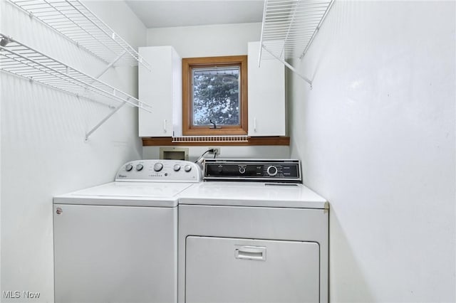 1318 Mirheath Dr, Huron, OH 44839 - laundry room with washer and clothes dryer and cabinet space