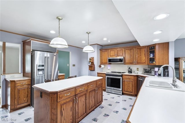 1318 Mirheath Dr, Huron, OH 44839 - kitchen featuring stainless steel appliances, brown cabinetry, light floors, a center island, and recessed lighting