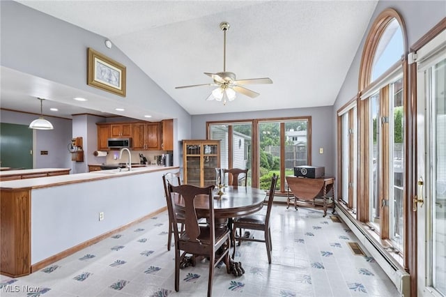 1318 Mirheath Dr, Huron, OH 44839 - dining room with lofted ceiling and a ceiling fan