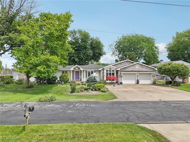 1318 Mirheath Dr, Huron, OH 44839 - ranch-style home featuring an attached garage, a front lawn, driveway, and stone siding