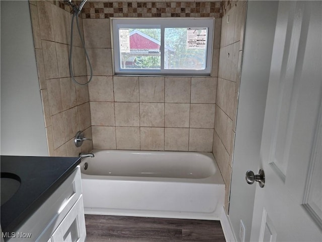 2500 Redgate Ln, Austintown, OH 44511 - bathroom featuring vanity, wood finished floors, and shower / bath combination