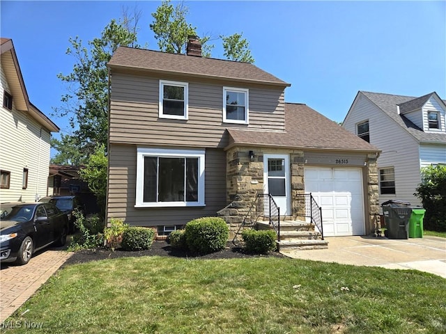 26313 Oriole Ave, Euclid, OH 44132 - view of front of property with an attached garage, a front yard, driveway, a chimney, and stone siding