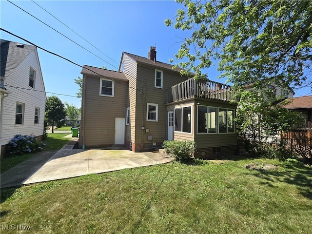 26313 Oriole Ave, Euclid, OH 44132 - back of property featuring a balcony, a patio area, and a chimney