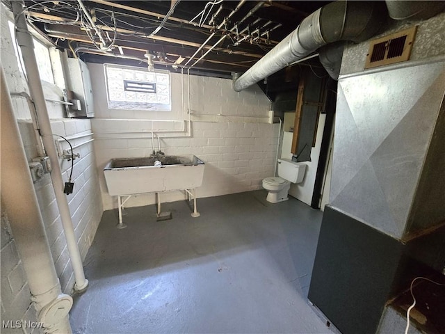 26313 Oriole Ave, Euclid, OH 44132 - below grade area featuring a sink and concrete block wall