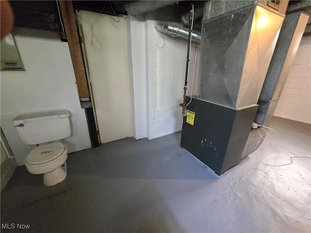26313 Oriole Ave, Euclid, OH 44132 - unfinished below grade area featuring heating unit and concrete block wall