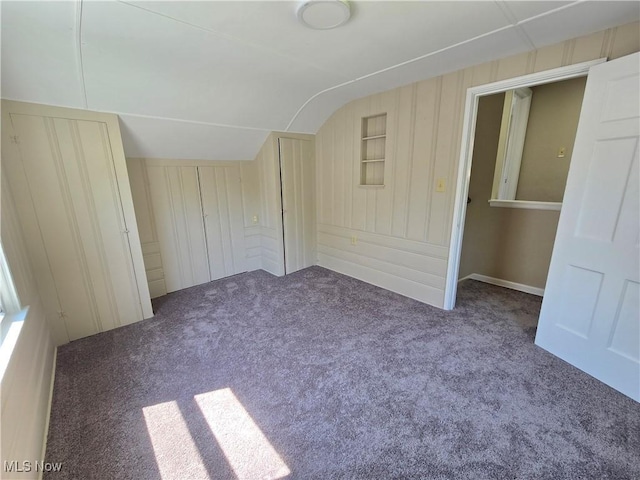 26313 Oriole Ave, Euclid, OH 44132 - unfurnished bedroom with vaulted ceiling and carpet flooring