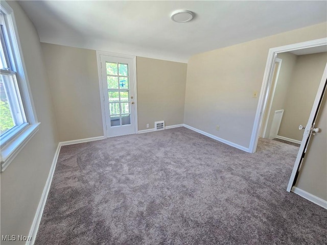 26313 Oriole Ave, Euclid, OH 44132 - carpeted empty room with plenty of natural light