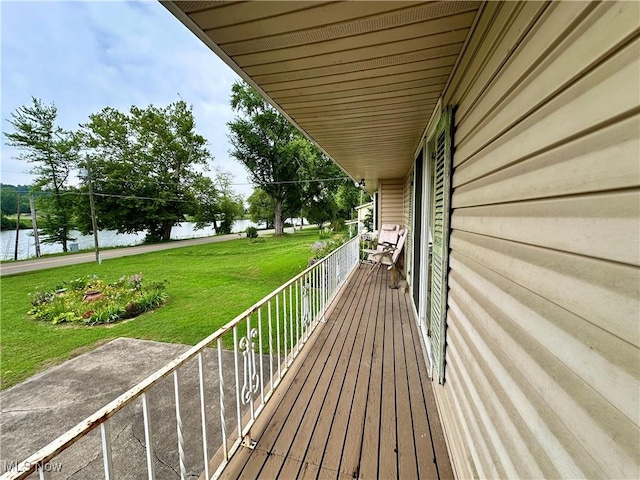 4145 Old River Rd, Philo, OH 43771 - wooden terrace with a water view and a lawn