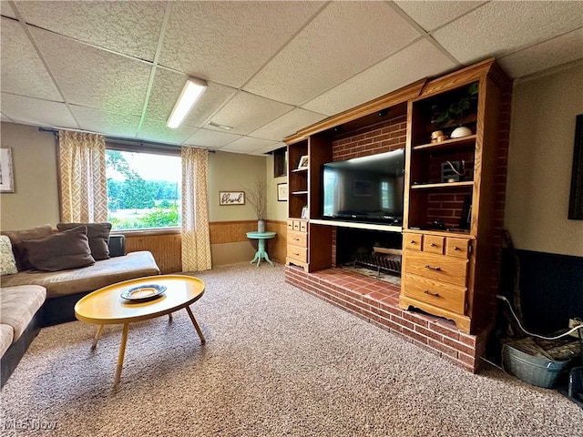 4145 Old River Rd, Philo, OH 43771 - living room with a paneled ceiling, carpet, a wainscoted wall, and wooden walls