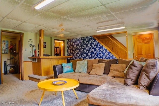 4145 Old River Rd, Philo, OH 43771 - living room featuring a paneled ceiling, stairway, a wainscoted wall, carpet floors, and a dry bar