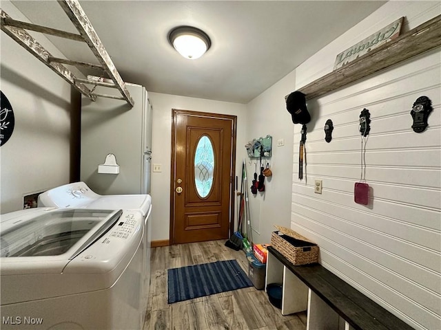 4145 Old River Rd, Philo, OH 43771 - laundry area featuring light wood-style flooring and washer and clothes dryer